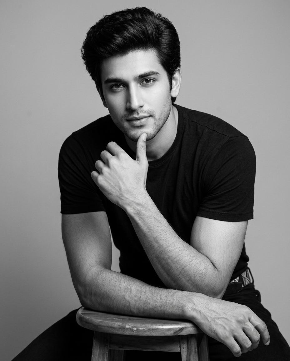 Man Masculine Studio Portrait AI Image Prompt | Black and White Dramatic Lighting Style